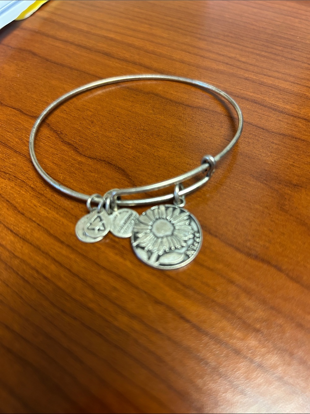 Alex and Ani Silver Flower Charm Bangle Bracelet with the word niece